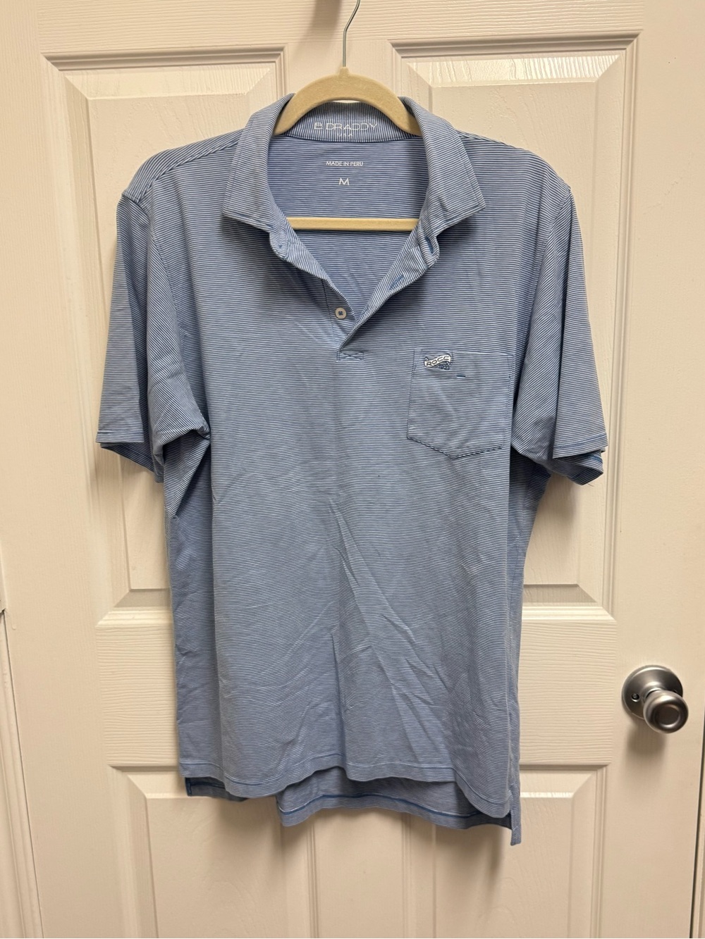 B. Draddy Blue Striped Polo
